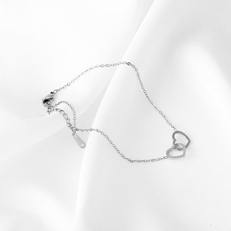 Linked Heart Bracelet In Silver