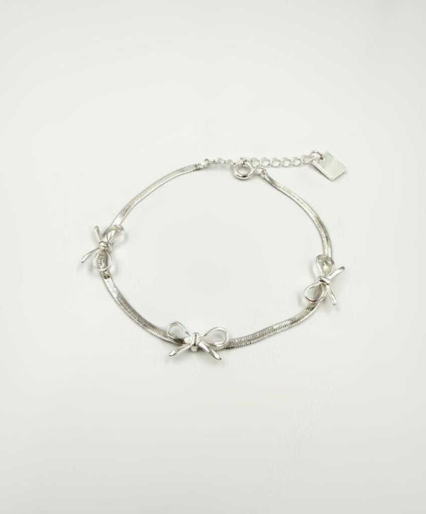 Bow Trio Bracelet In Silver