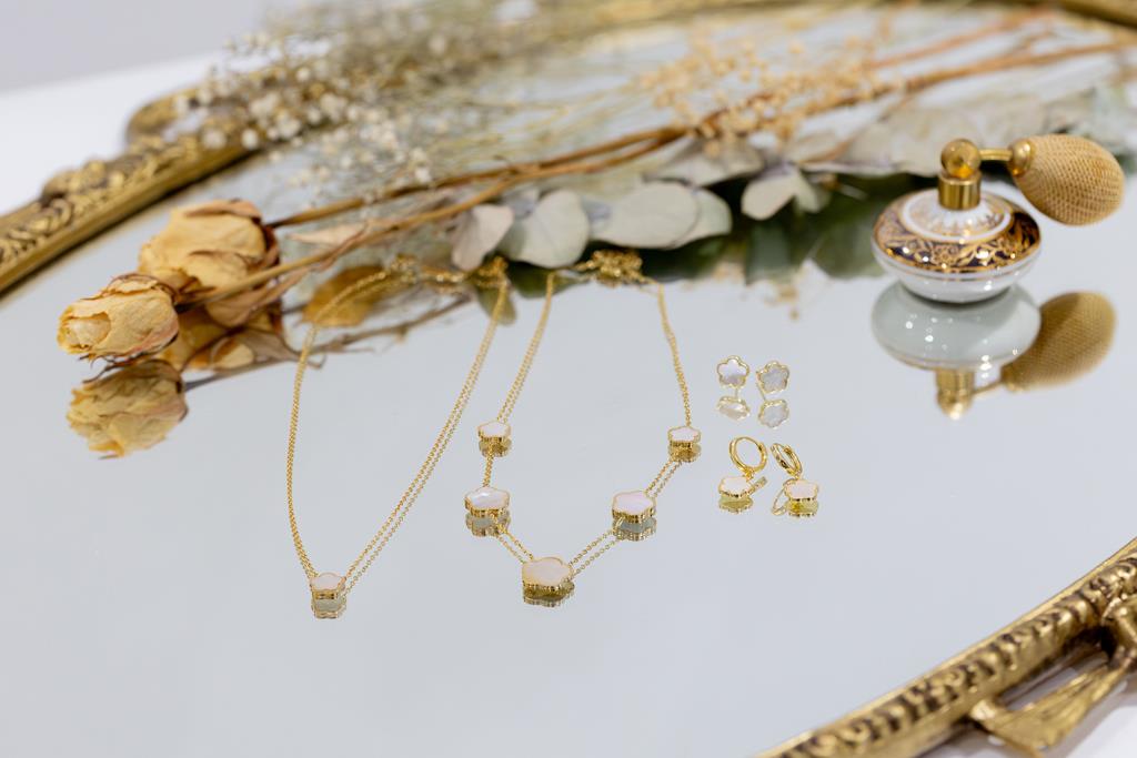 Flower Mother Of Pearl Huggie Earrings In Gold